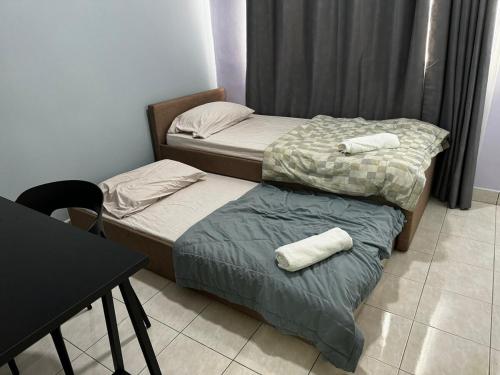 Postel nebo postele na pokoji v ubytování 3R2B Homestay Puchong behind Bandar Puteri