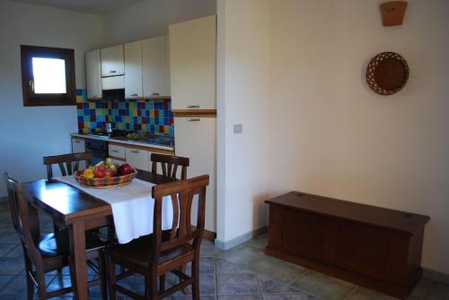 Kuchyň nebo kuchyňský kout v ubytování Residence Oasi e Oasi Blu