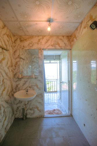 Koupelna v ubytování Homestay A Súy -View Hồ Tà Đùng
