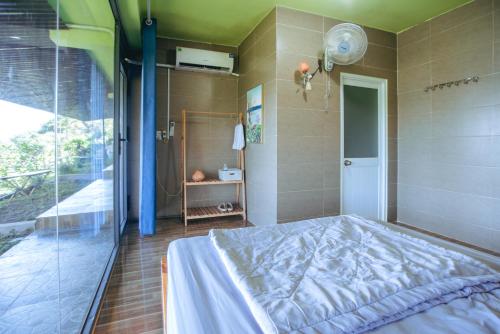 Postel nebo postele na pokoji v ubytování Homestay A Súy -View Hồ Tà Đùng