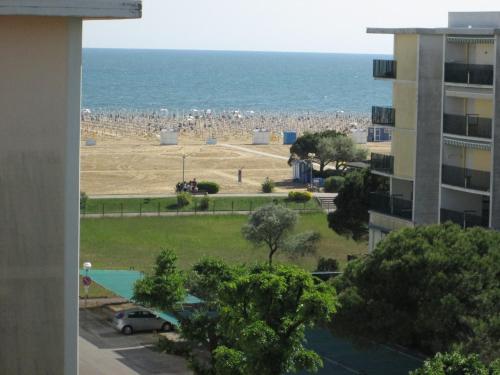 a view of a beach from a building at Appartamenti Katja in Bibione