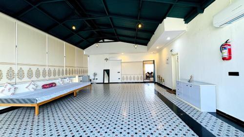 Ένα ή περισσότερα κρεβάτια σε δωμάτιο στο Noor Serene Penthouse