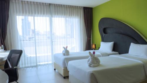 Katil atau katil-katil dalam bilik di Blue Boat Hotel JC