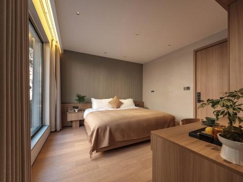 青岛Qingdao Wushe Yujianshanju Tangchi Seaview Hotel的相册照片