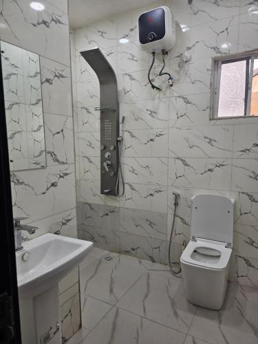 Koupelna v ubytování Hen-Cap Apartment Services