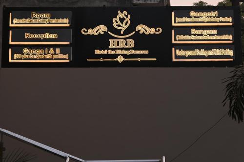 Hotel The Rising Banarasに飾ってある許可証、賞状、看板またはその他の書類