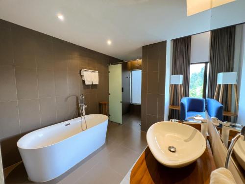 Koupelna v ubytování Hotel Dafam Wonosobo