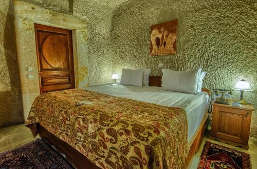 Katil atau katil-katil dalam bilik di MUSEUM HOTEL - Relais & Châteaux
