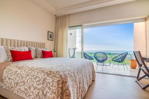 Ένα ή περισσότερα κρεβάτια σε δωμάτιο στο Ocean & Golf Duplex - Taghazout