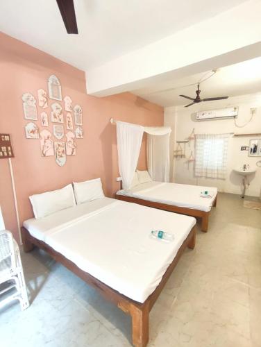 Postel nebo postele na pokoji v ubytování Vanam Pool Stay