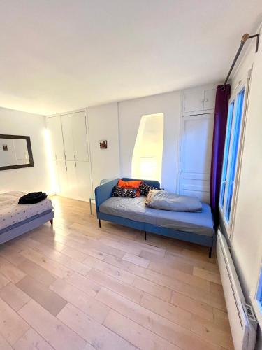 Lovely apartment 10 min walk to Louvre 3 Persons