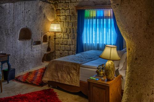 Katil atau katil-katil dalam bilik di MUSEUM HOTEL - Relais & Châteaux