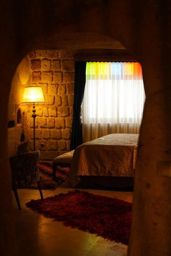 Katil atau katil-katil dalam bilik di MUSEUM HOTEL - Relais & Châteaux