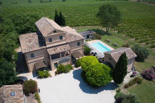 an aerial view of an estate with a swimming pool at La Vita Nuova Appartements - Appart B&B in Morro dʼAlba