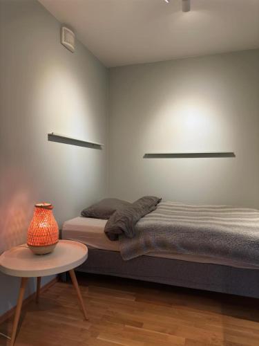 Ένα ή περισσότερα κρεβάτια σε δωμάτιο στο Spacious apartment with a great view and parking