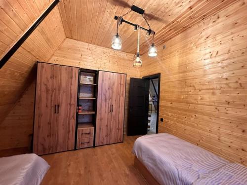 Postel nebo postele na pokoji v ubytování A frame Xizi