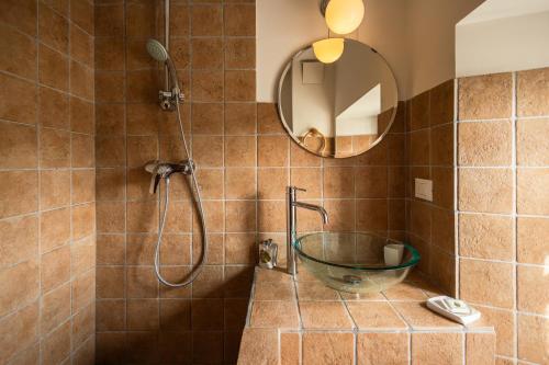 Ein Badezimmer in der Unterkunft Albergo Diffuso Comeglians