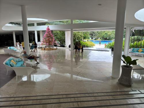 Bazén v ubytování Tambuli Seaside Resort & Residences nebo v jeho okolí