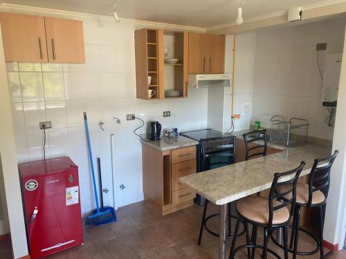 Kuchyň nebo kuchyňský kout v ubytování departamento en condominio Puerto montt