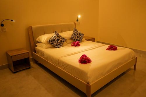 Katil atau katil-katil dalam bilik di Charming Holiday Lodge