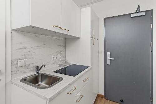 Una cocina o zona de cocina en Art Hotel Vienna