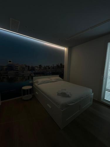 Postel nebo postele na pokoji v ubytování Miramare Luxury Rooms