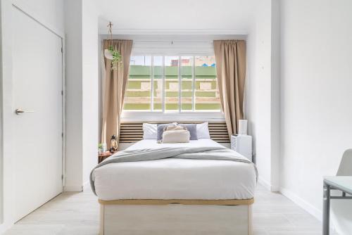 A bed or beds in a room at Studio El Secretario