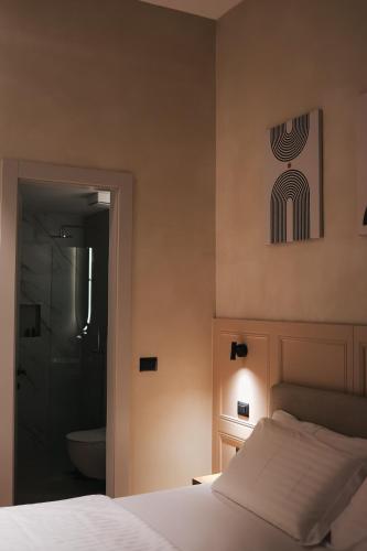 Ein Bett oder Betten in einem Zimmer der Unterkunft Z art Hotel