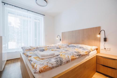 Postel nebo postele na pokoji v ubytování Apartmán Soňa