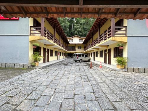 a van parked in the middle of a building at Pousada Recanto do Alto de Teresópolis in Teresópolis
