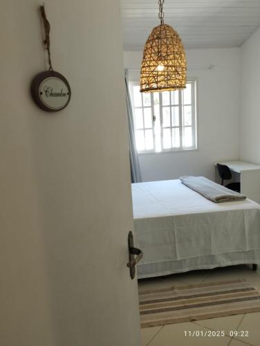 Katil atau katil-katil dalam bilik di Vila da Sol Itaipava casas e estúdios