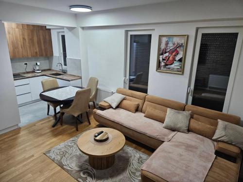 Kuchyň nebo kuchyňský kout v ubytování Luxury Vlae Apartaments