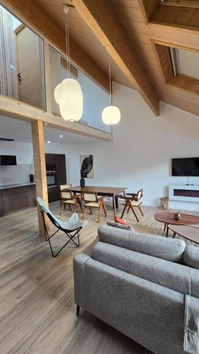 Posezení v ubytování Duplex type chalet dans le Jura
