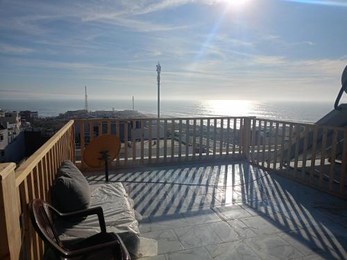 a balcony with a view of the ocean at Atlantic coast imssouane in Imsouane