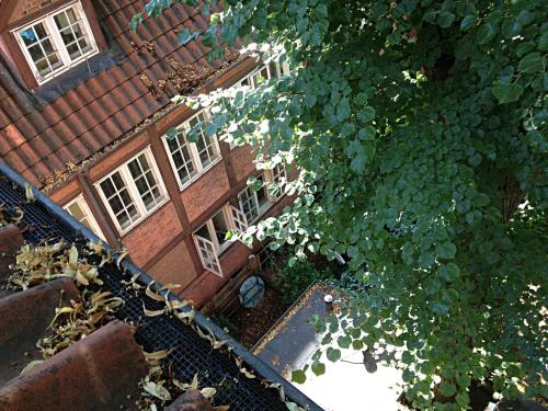 an overhead view of a building with windows at Frauenhotel Hanseatin - Women Only in Hamburg