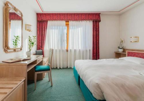 Postel nebo postele na pokoji v ubytování Chalet Stadio