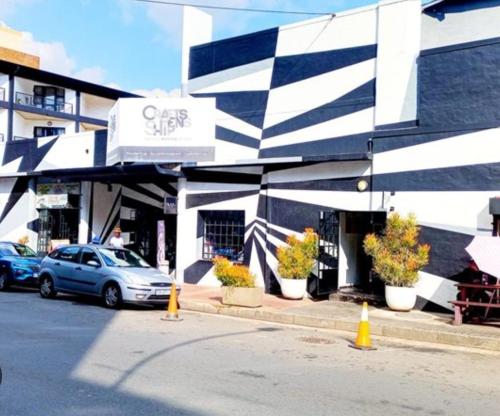 a car parked in front of a building at The Hills by maboneng in Johannesburg