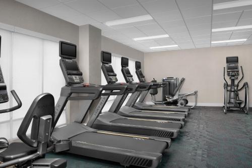 a row of tread machines in a gym at TownePlace Suites By Marriott Lake City in Lake City