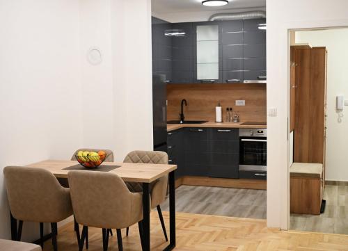 Kuchyň nebo kuchyňský kout v ubytování Apartman Maka