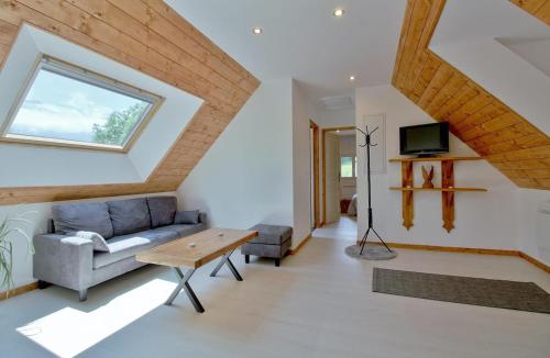 Una televisión o centro de entretenimiento en Appartement avec vue panoramique