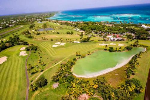 an aerial view of a golf course at the ocean at Studio Atoumo Marine 5 in Saint-François