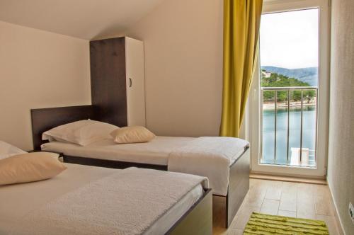Postel nebo postele na pokoji v ubytování Holiday Home Puteus