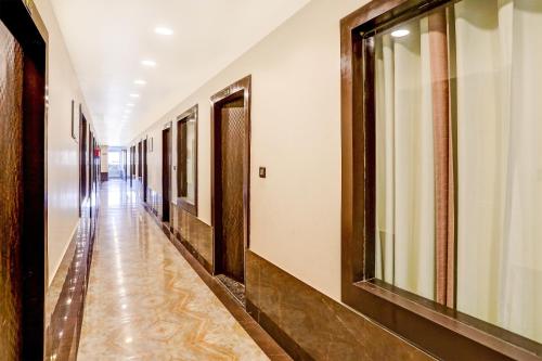 a corridor of a building with a corridorngth at Hotel O S.N Sky Awadh in Lucknow