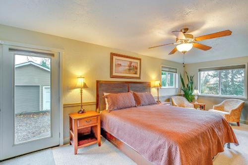 a bedroom with a bed and a ceiling fan at Sequoia Vacation Rental in Milton