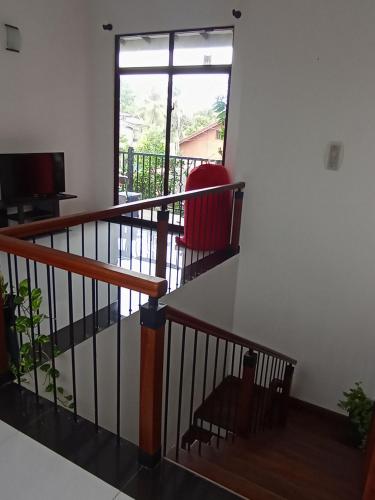 TV a/nebo společenská místnost v ubytování Thenu Homestay