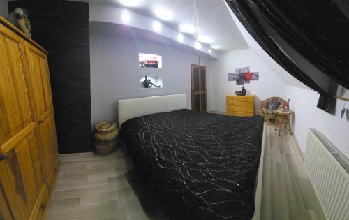 Cama o camas de una habitación en Ubytovanie Oslany