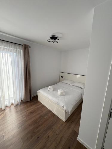 Postel nebo postele na pokoji v ubytování Pensiunea Turc