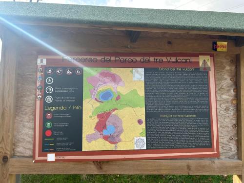 a sign at the entrance to a park with a map at Casa vacanze San Rocco in San Venanzo