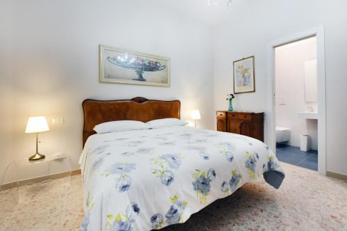 Ένα ή περισσότερα κρεβάτια σε δωμάτιο στο Casa di mamma