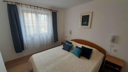 Postel nebo postele na pokoji v ubytování Apartment Porat 22